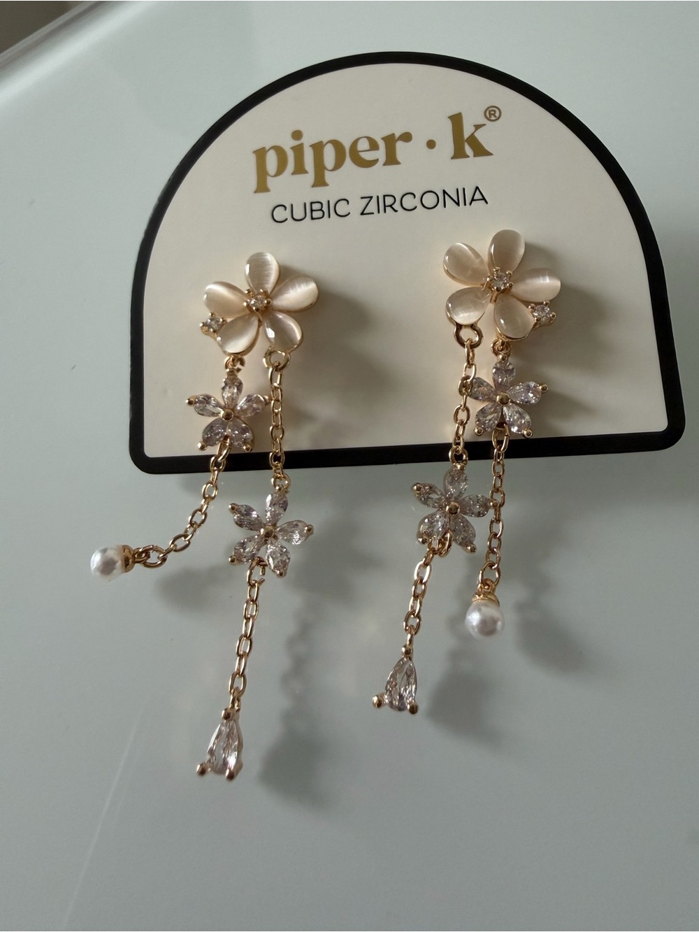Gold cubic zirconia Floral Drop Earrings with Cream cat eye details